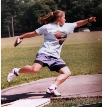 Mandy throwing discus in high school.